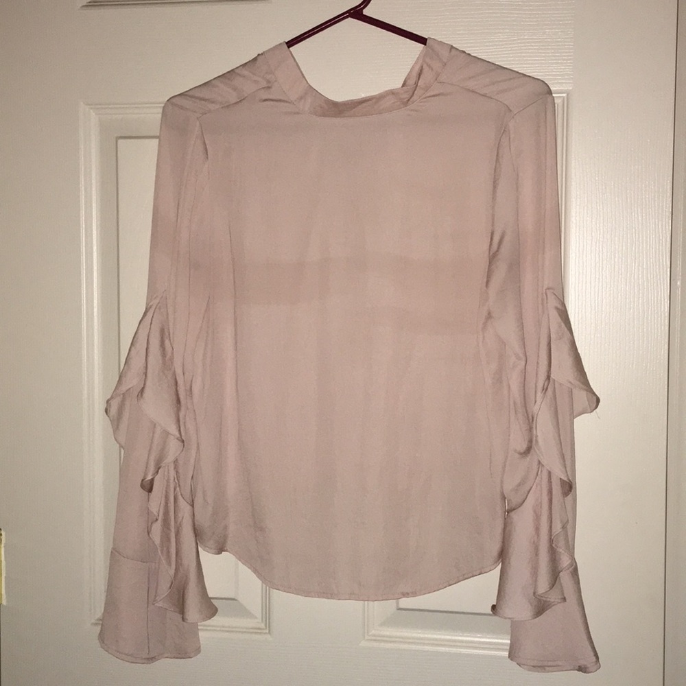 Blouse with button closure on back